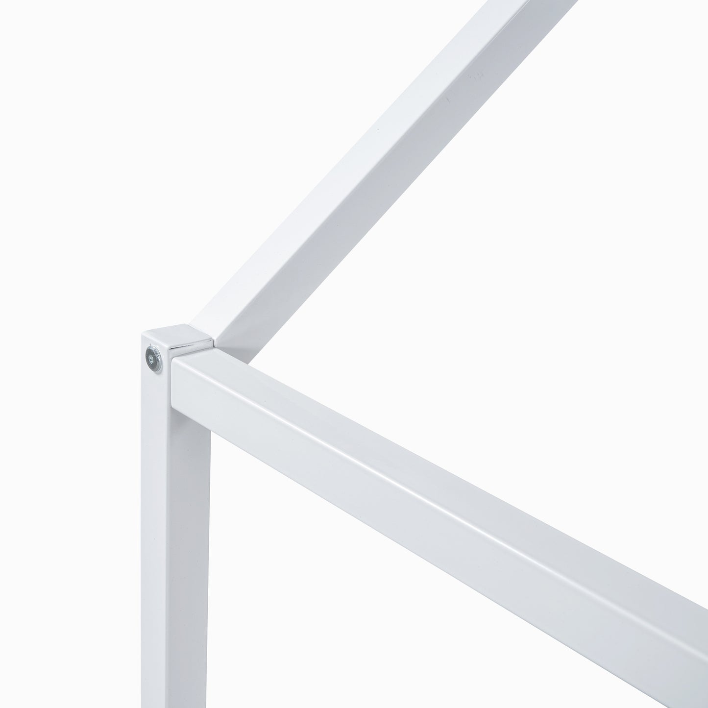 White metal bed frame corner detail