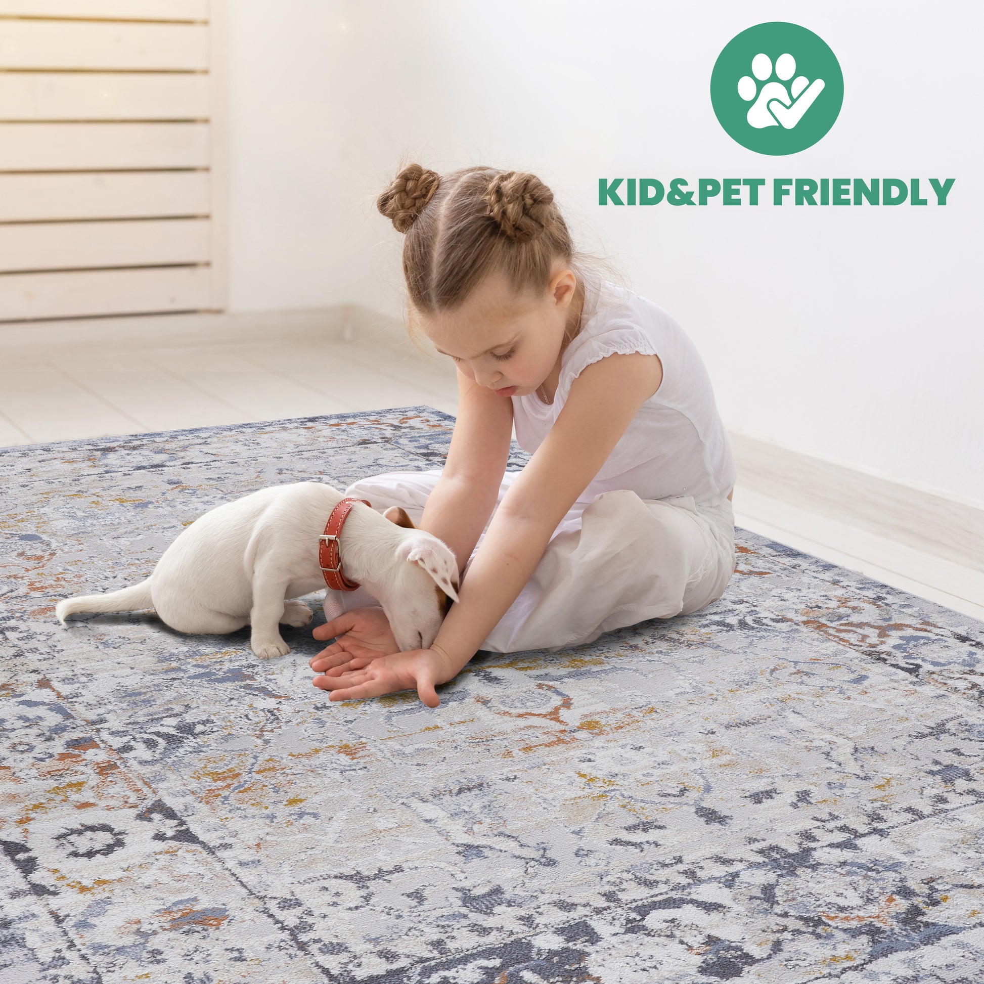 Soft grey oriental rug with subtle orange and blue accents ideal for living rooms
