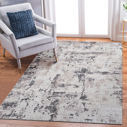 Abstract grey and beige distressed area rug with plush texture