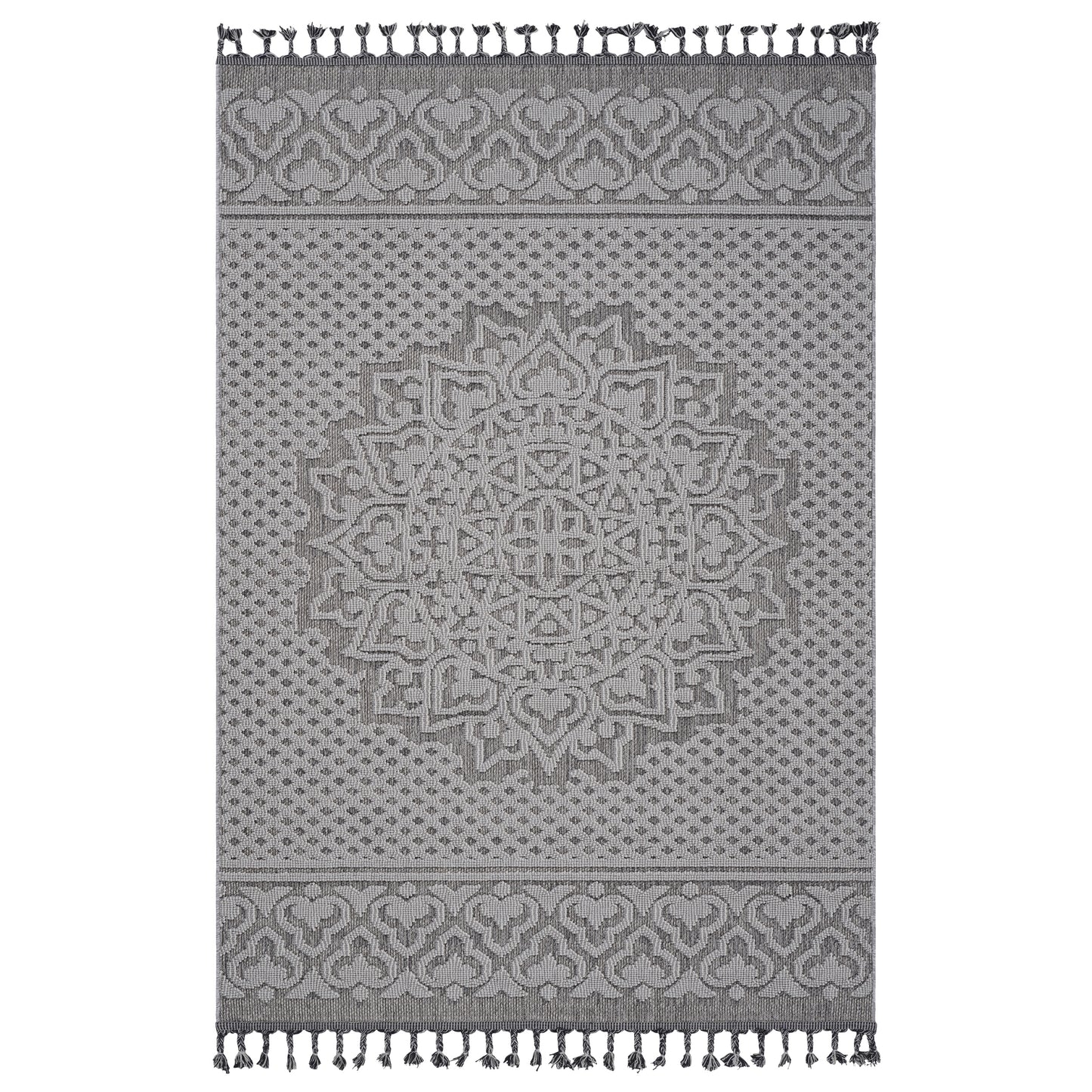 Grey patterned rug with tassel accents ideal for bohemian decor