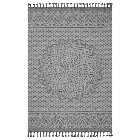Grey patterned rug with tassel accents ideal for bohemian decor