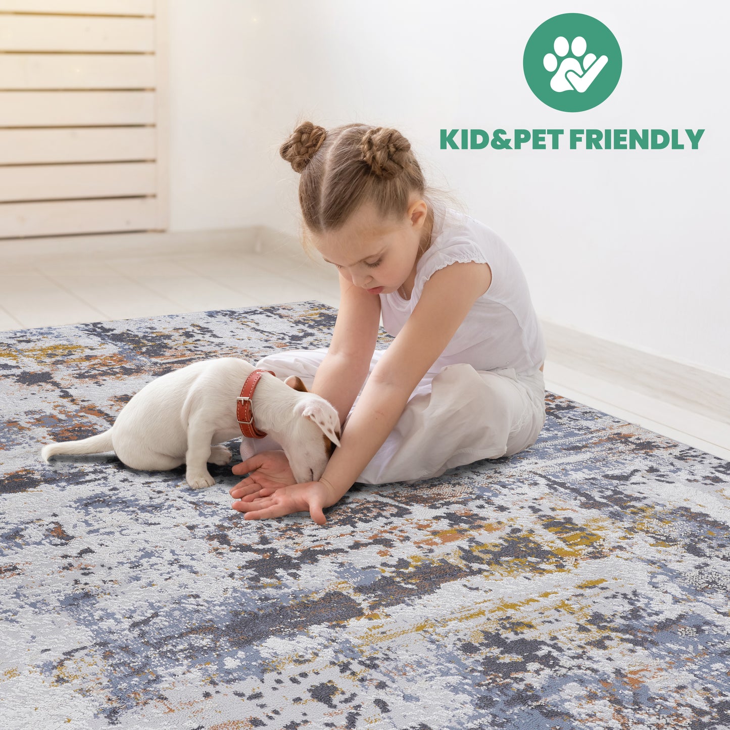 Abstract blue and gold distressed rug with a child and puppy