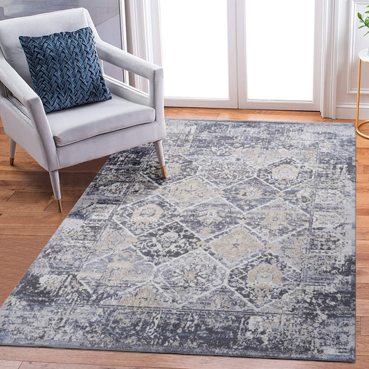 Distressed grey and cream Persian rug with intricate floral pattern and soft texture