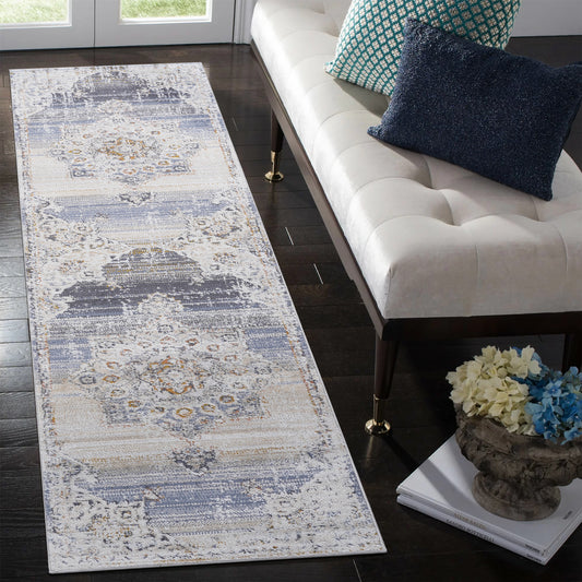 Distressed gray and cream abstract runner rug with muted blue accents