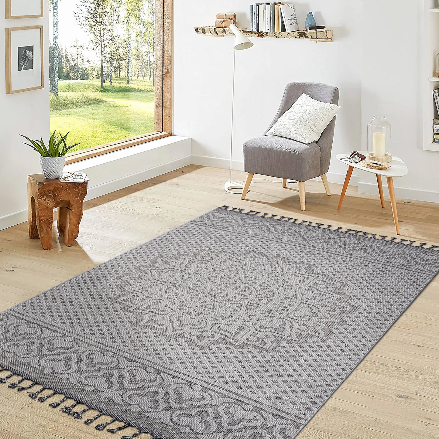 Gray tribal print area rug with tasseled edges perfect for living rooms