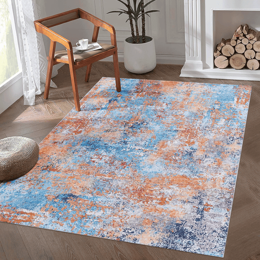 Abstract distressed area rug in blue orange and cream for living rooms