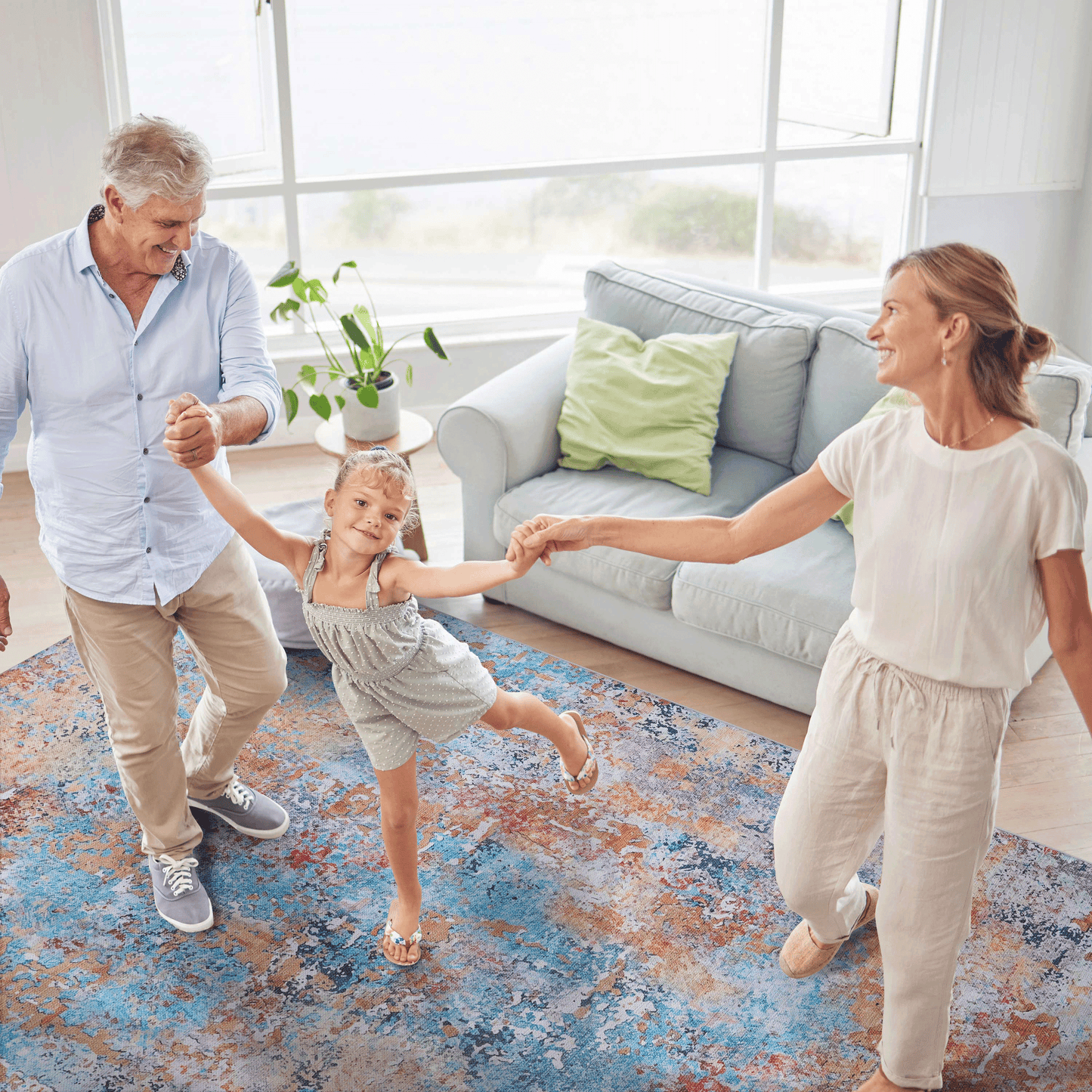 Abstract patterned area rug in blue and rust tones enhancing a modern living space