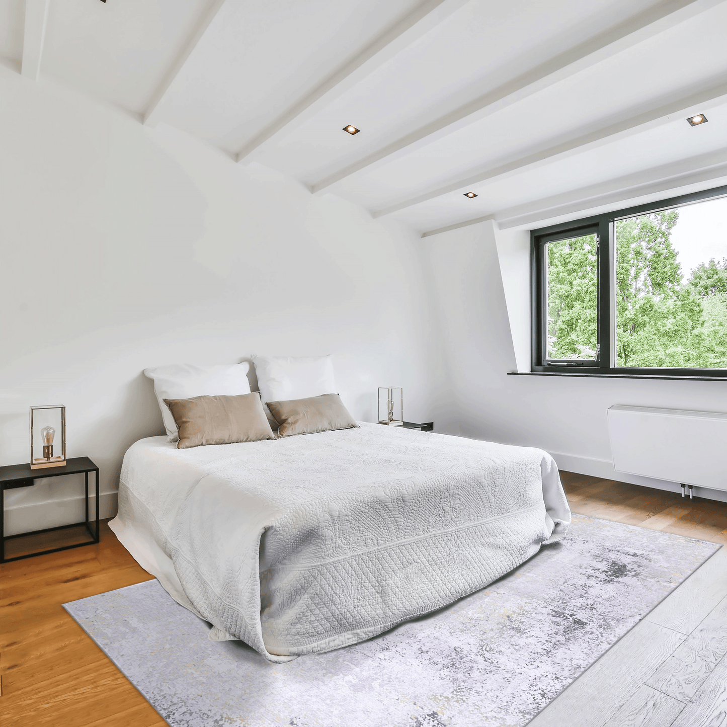 White textured bedspread with brown accent pillows on a modern bedroom bed