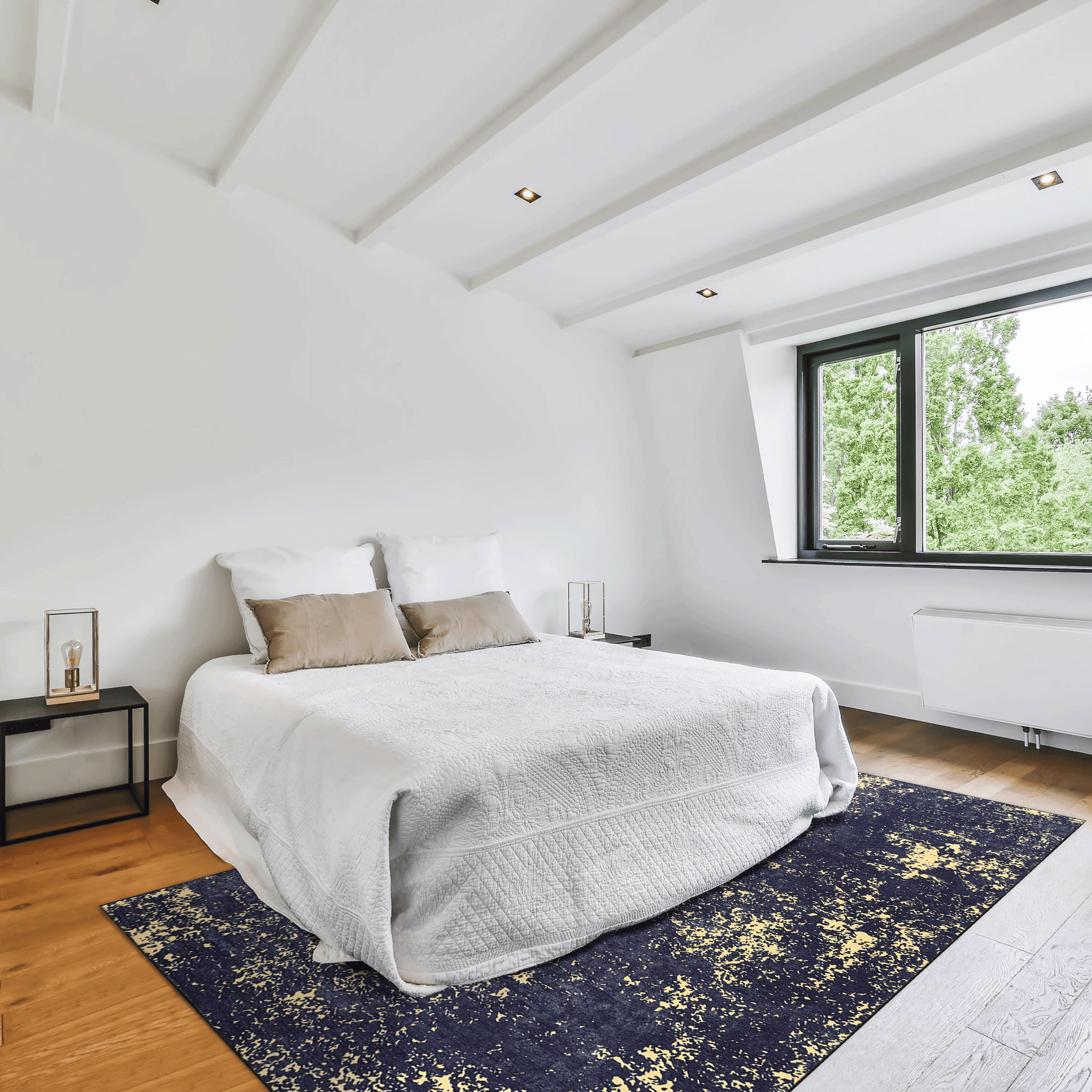 Modern navy blue and gold abstract rug complements a white quilted bed