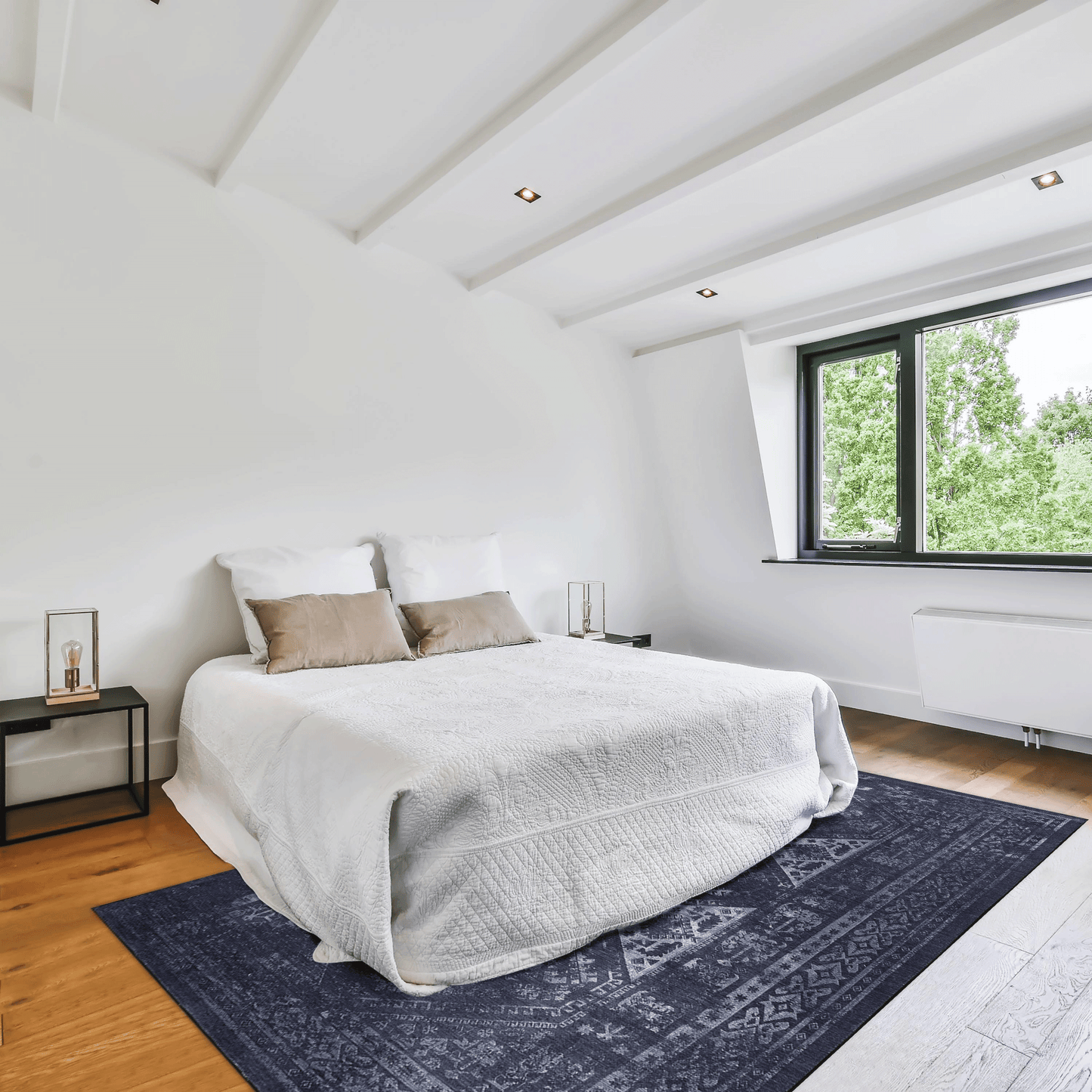 Quilted white duvet with decorative stitching on a kingsize bed adding warmth and texture