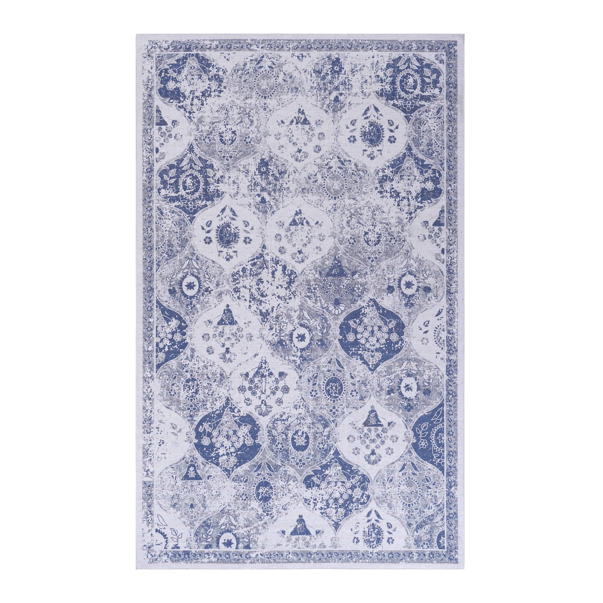 Blue and white distressed oriental rug with intricate floral and geometric patterns