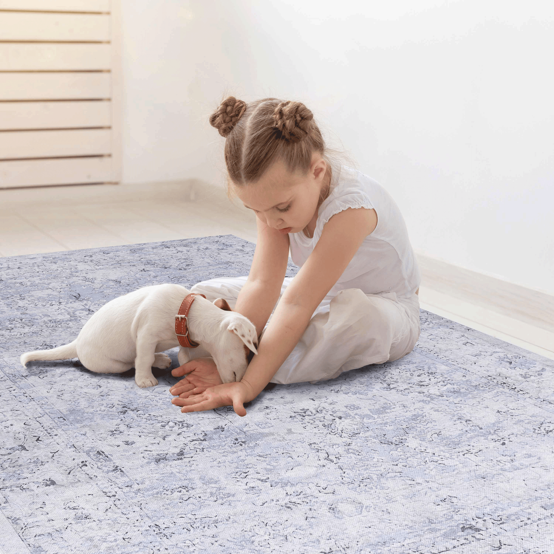 Light blue distressed floral oriental rug with subtle grey patterns