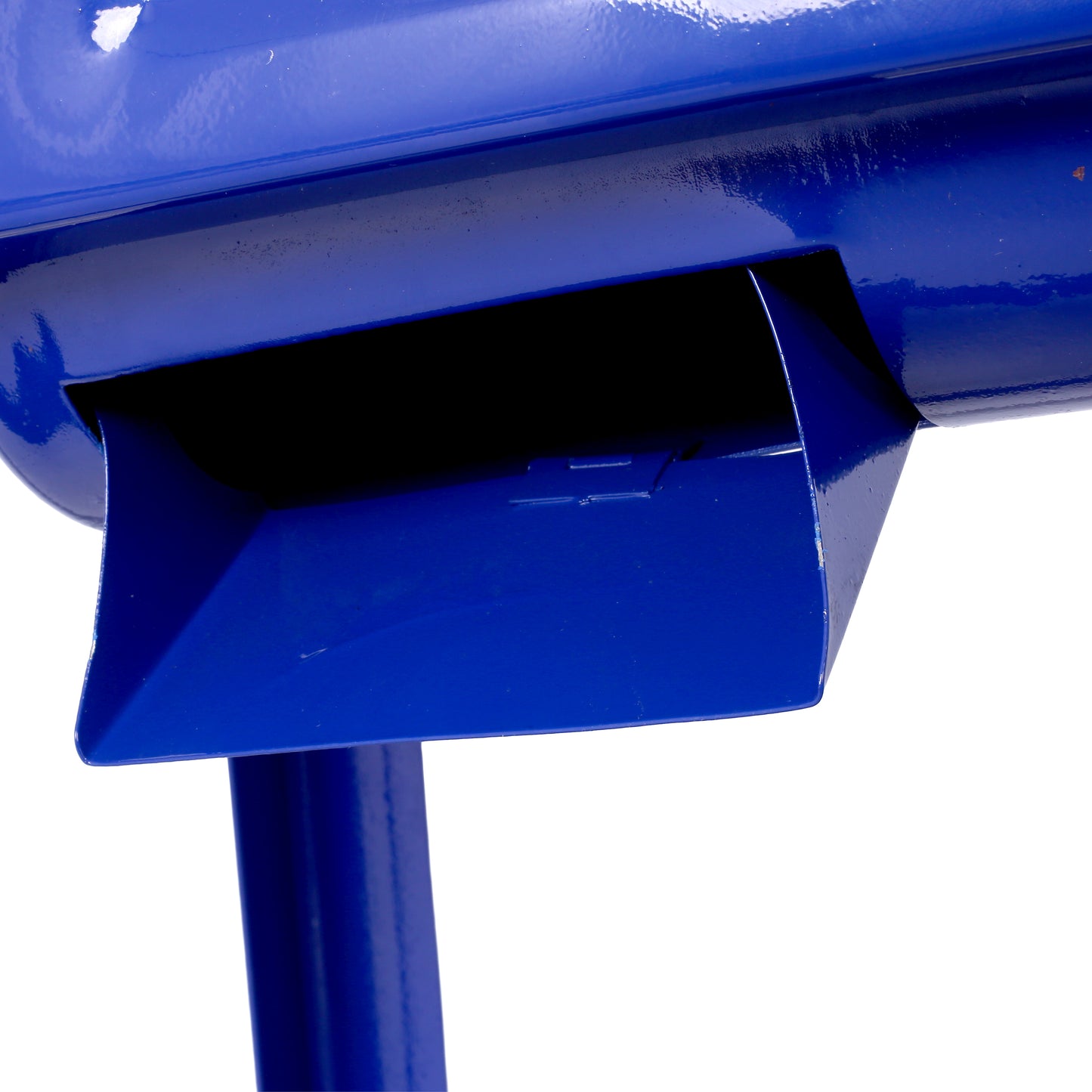 Closeup of a blue metal mailbox slot with visible paint texture