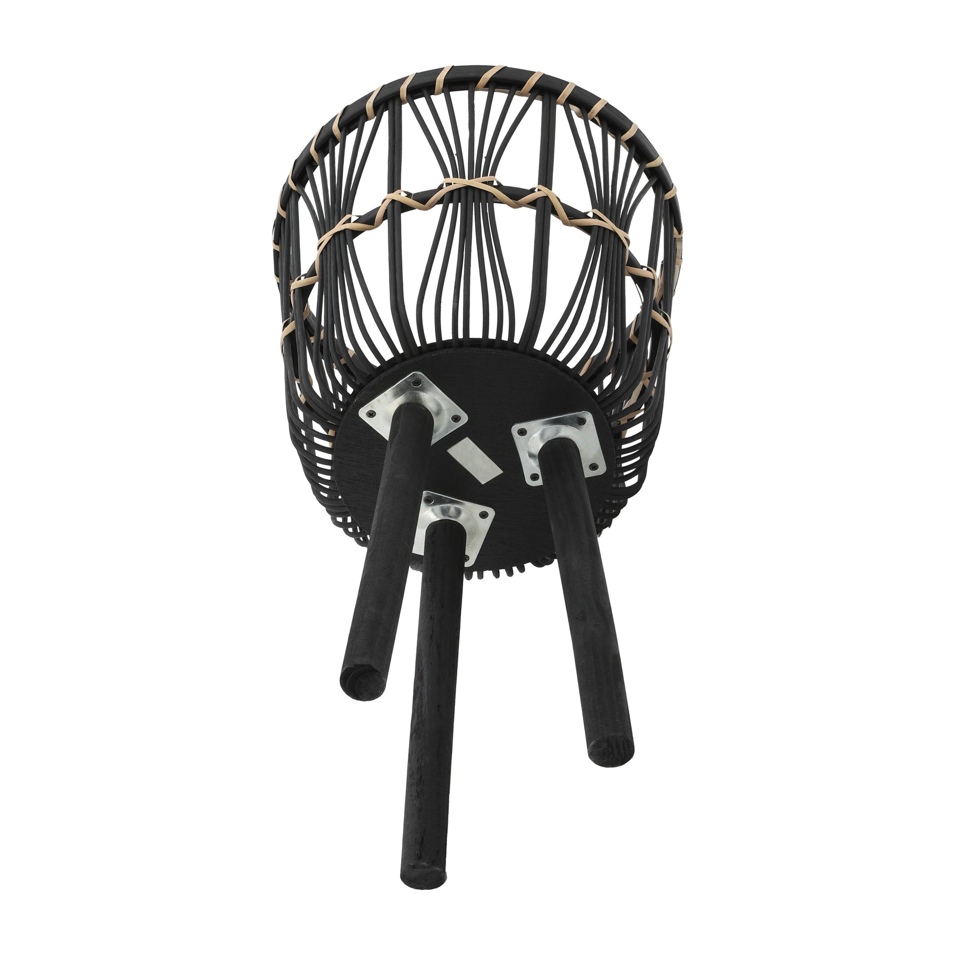 Black rattan stool with tapered wooden legs and natural woven accents