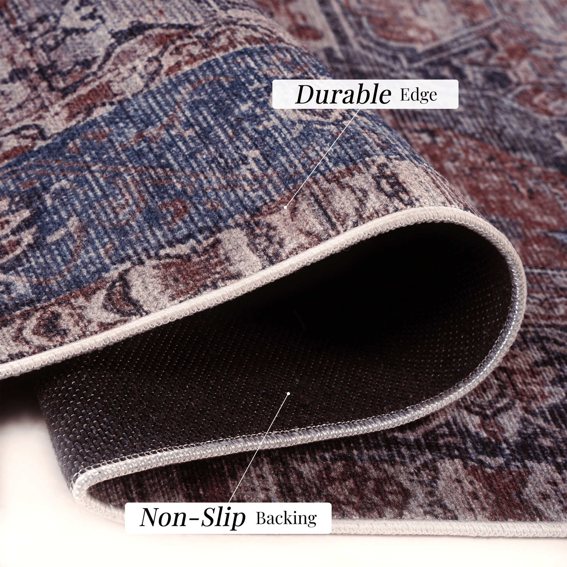 Closeup of a vintagestyle oriental rug in blue and burgundy showcasing its intricate pattern and durable edge