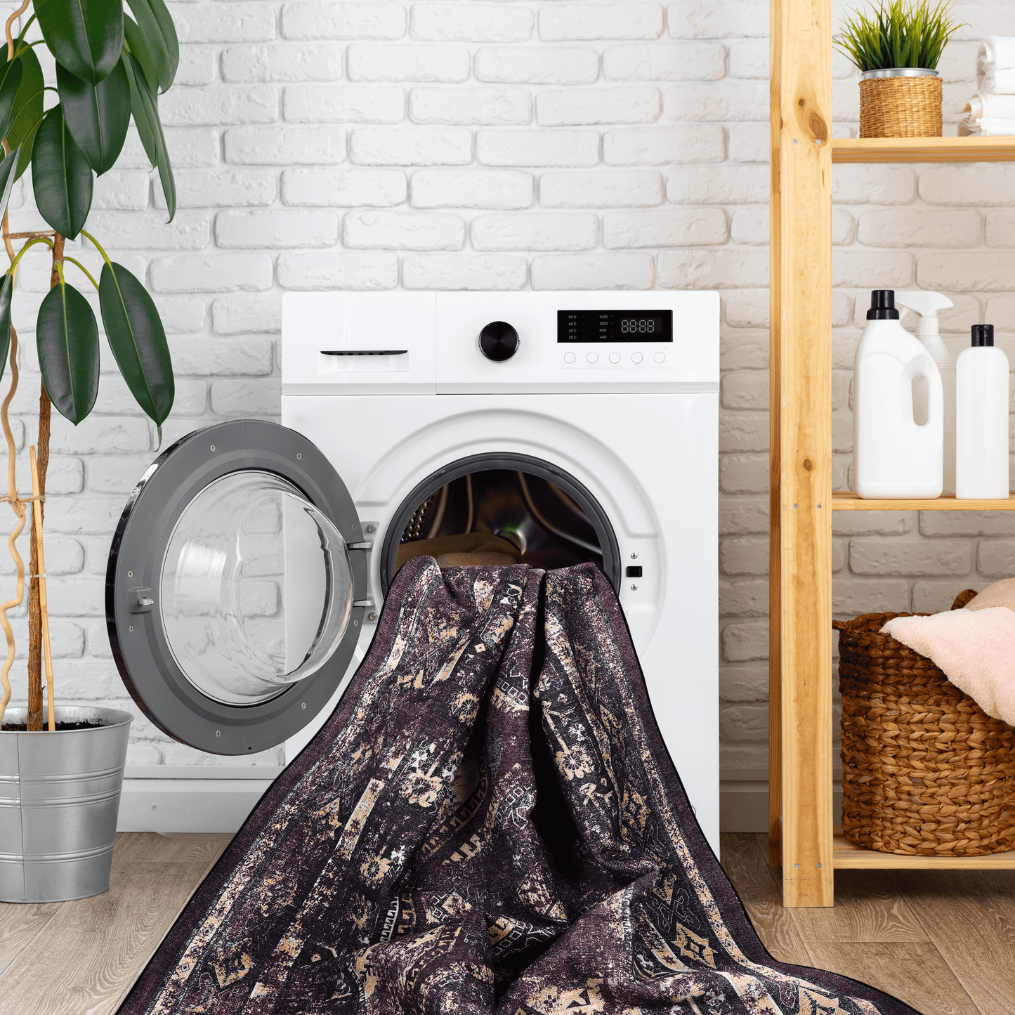 Dark purple area rug with intricate cream and tan geometric pattern ready for washing