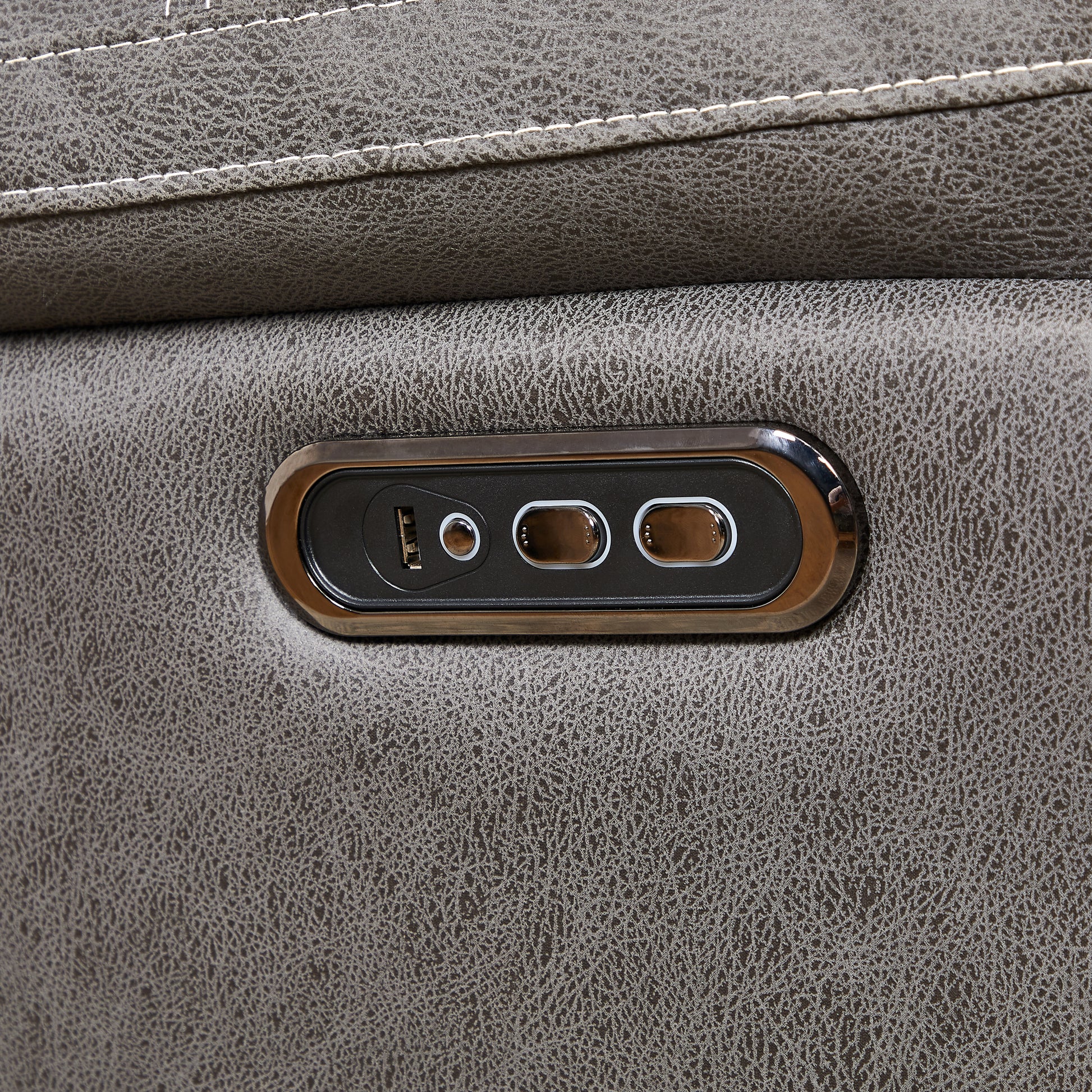 Brown faux leather recliner control panel with USB port and buttons