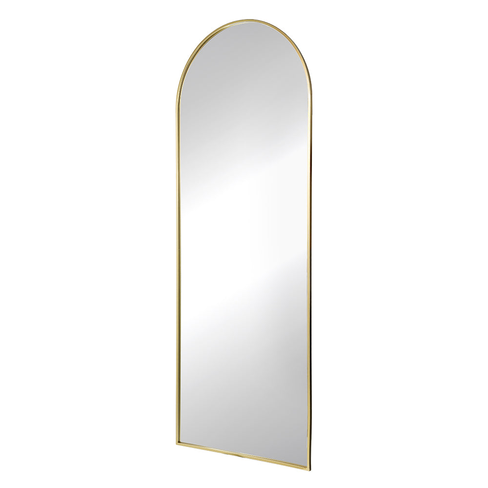 Tall arched mirror with a thin gold metal frame perfect for fulllength views