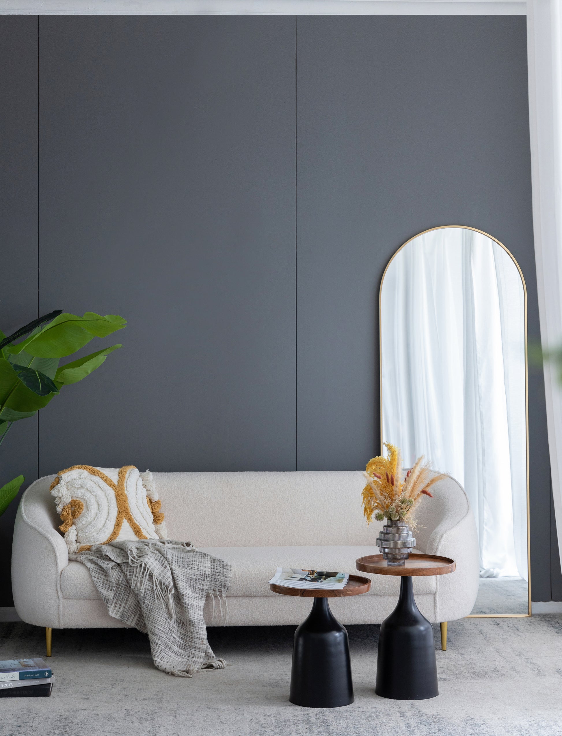Textured boucle sofa in cream with gold legs perfect for a modern living room