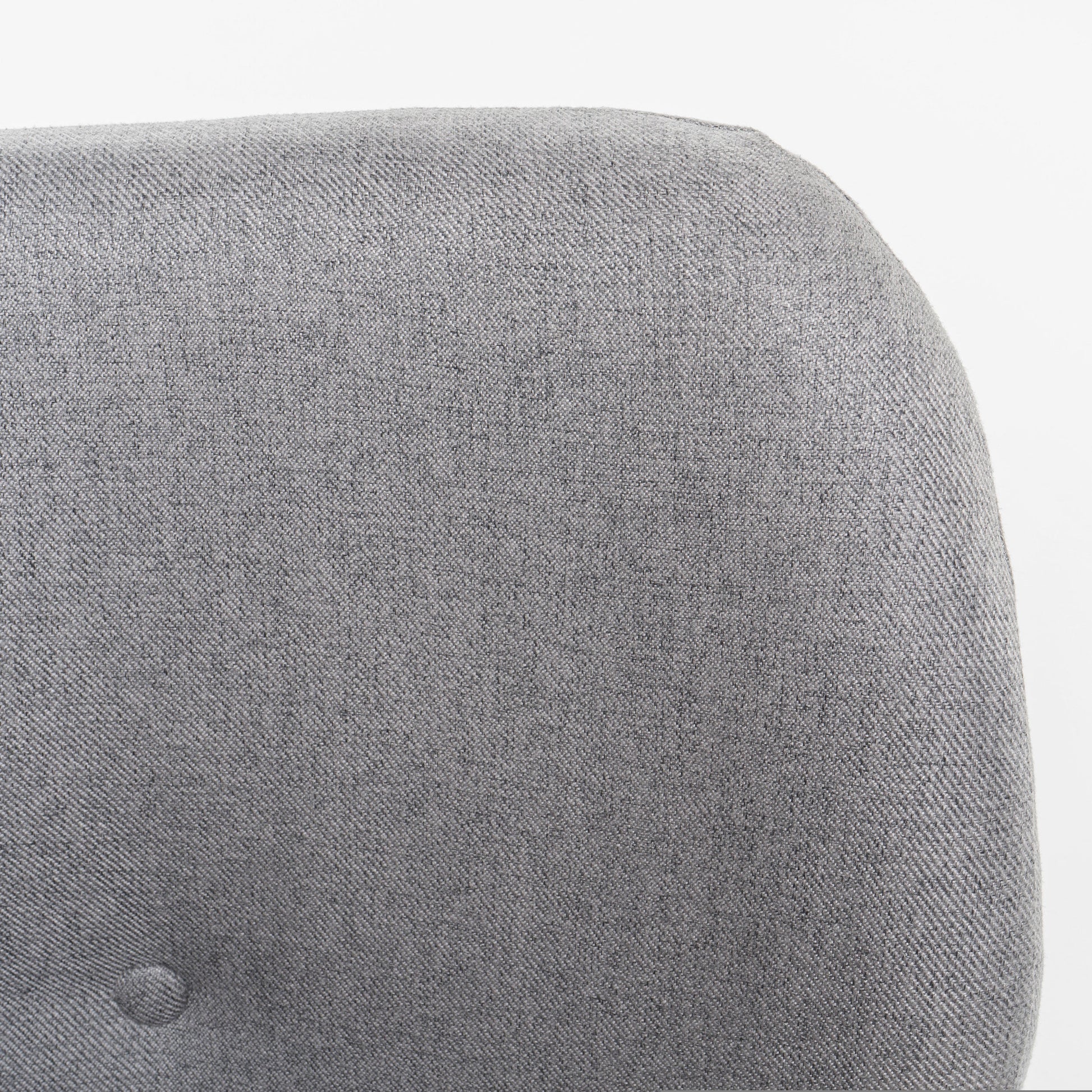 Closeup texture of grey tweed fabric on a modern chair