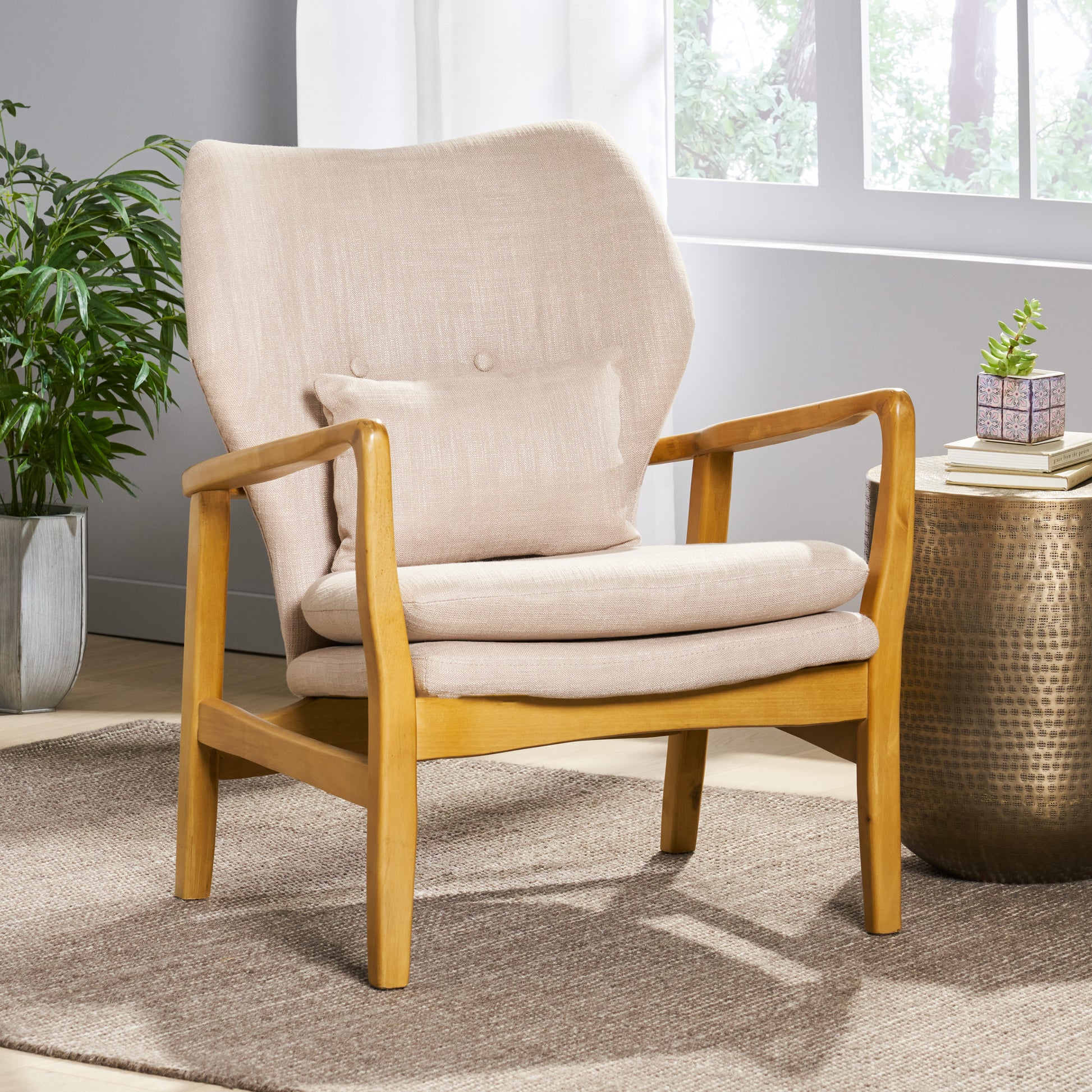 Beige upholstered accent chair with natural wood frame perfect for living room