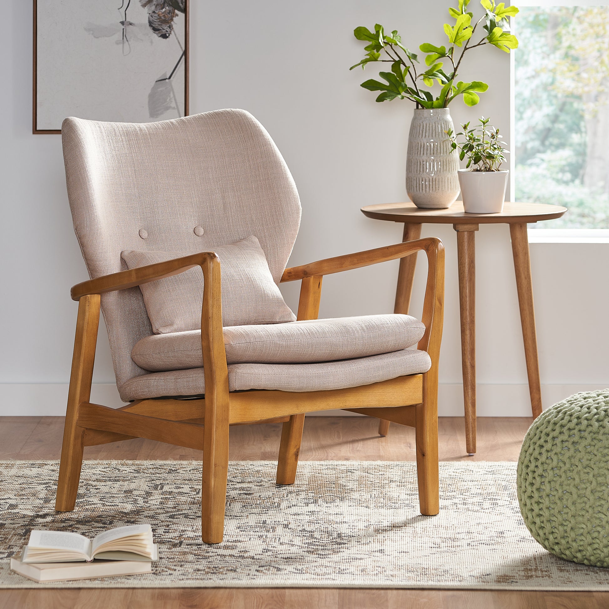 Midcentury modern accent chair with light beige textured fabric and natural wood frame