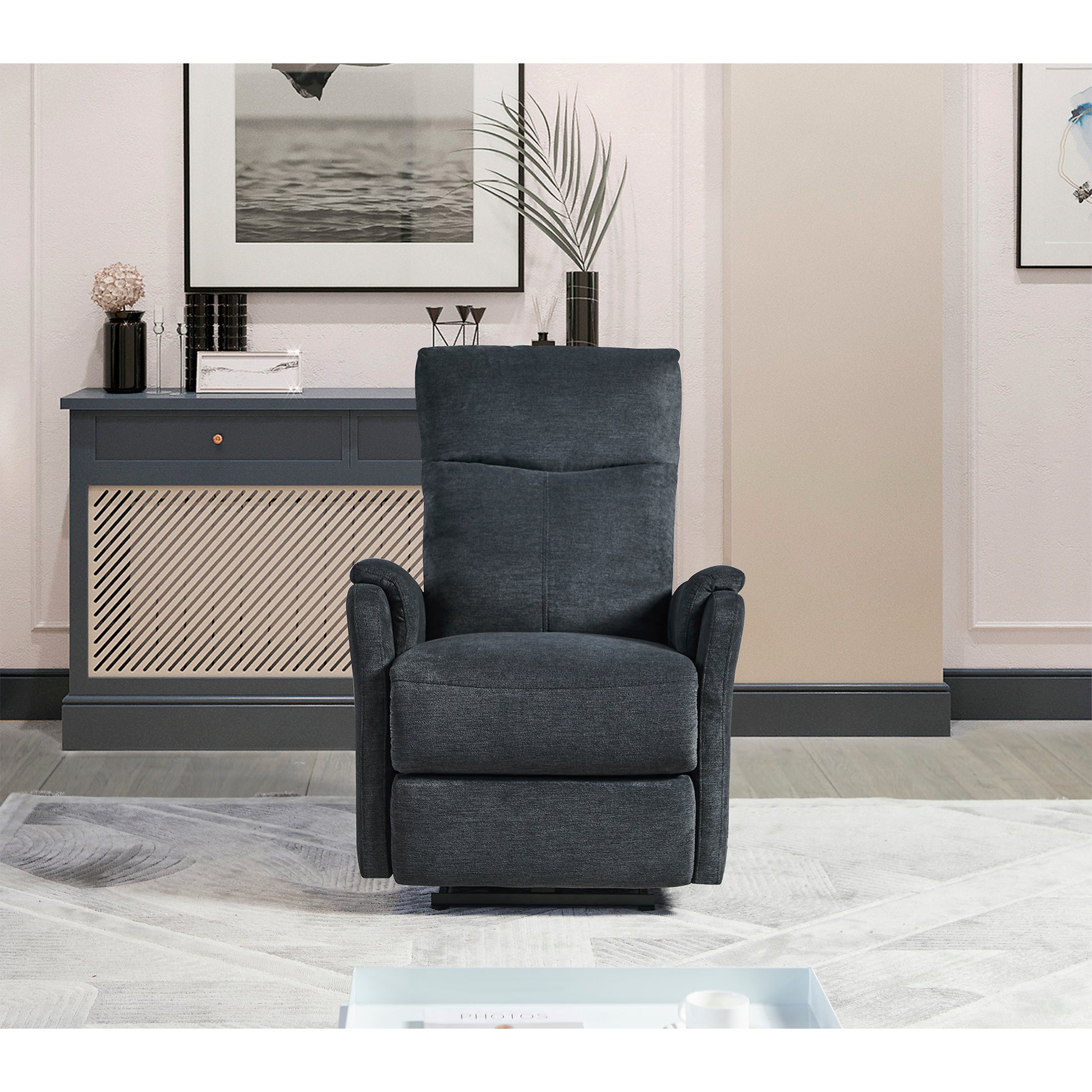 Dark grey upholstered power recliner with plush cushioning and padded arms