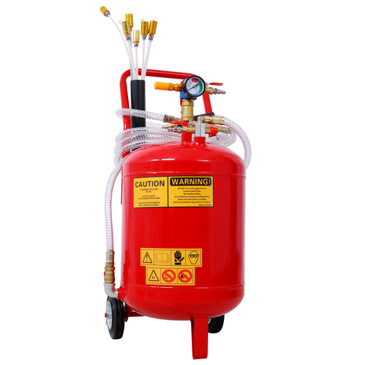 Red portable vacuum tank with pressure gauge and hoses for auto repair