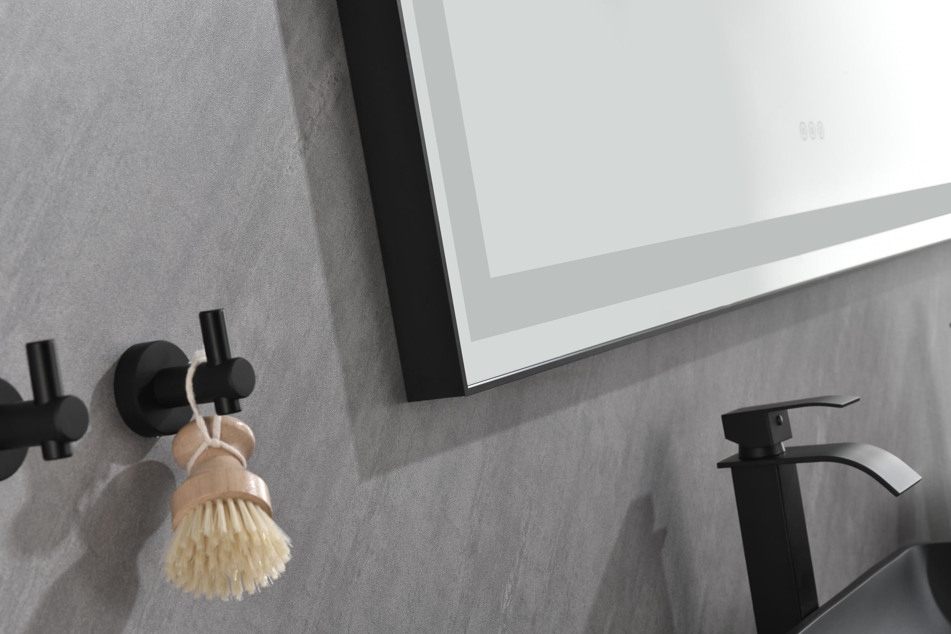 Black minimalist bathroom faucet with waterfall spout designed for modern vanities