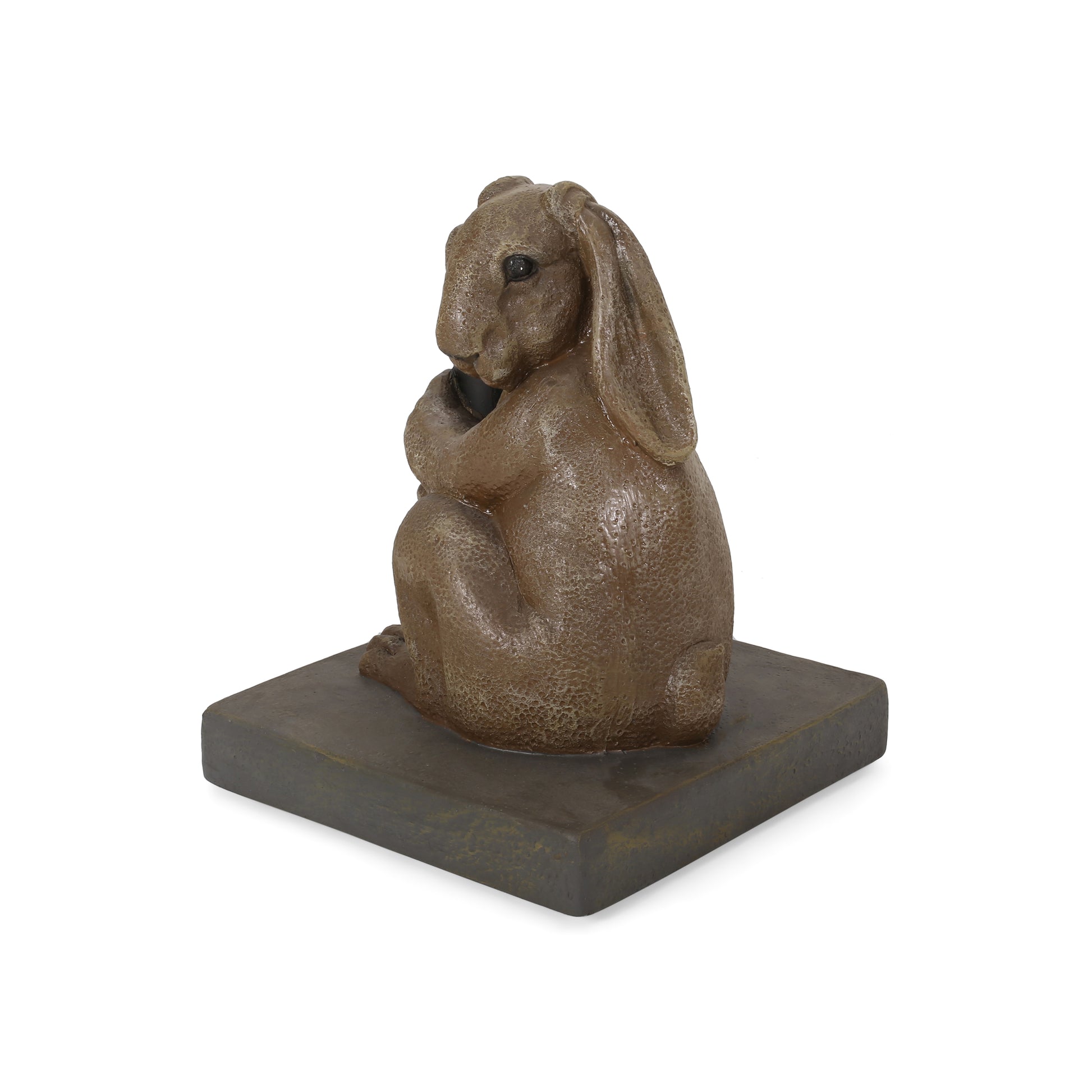 Brown resin bunny sculpture holding a sphere on a dark base