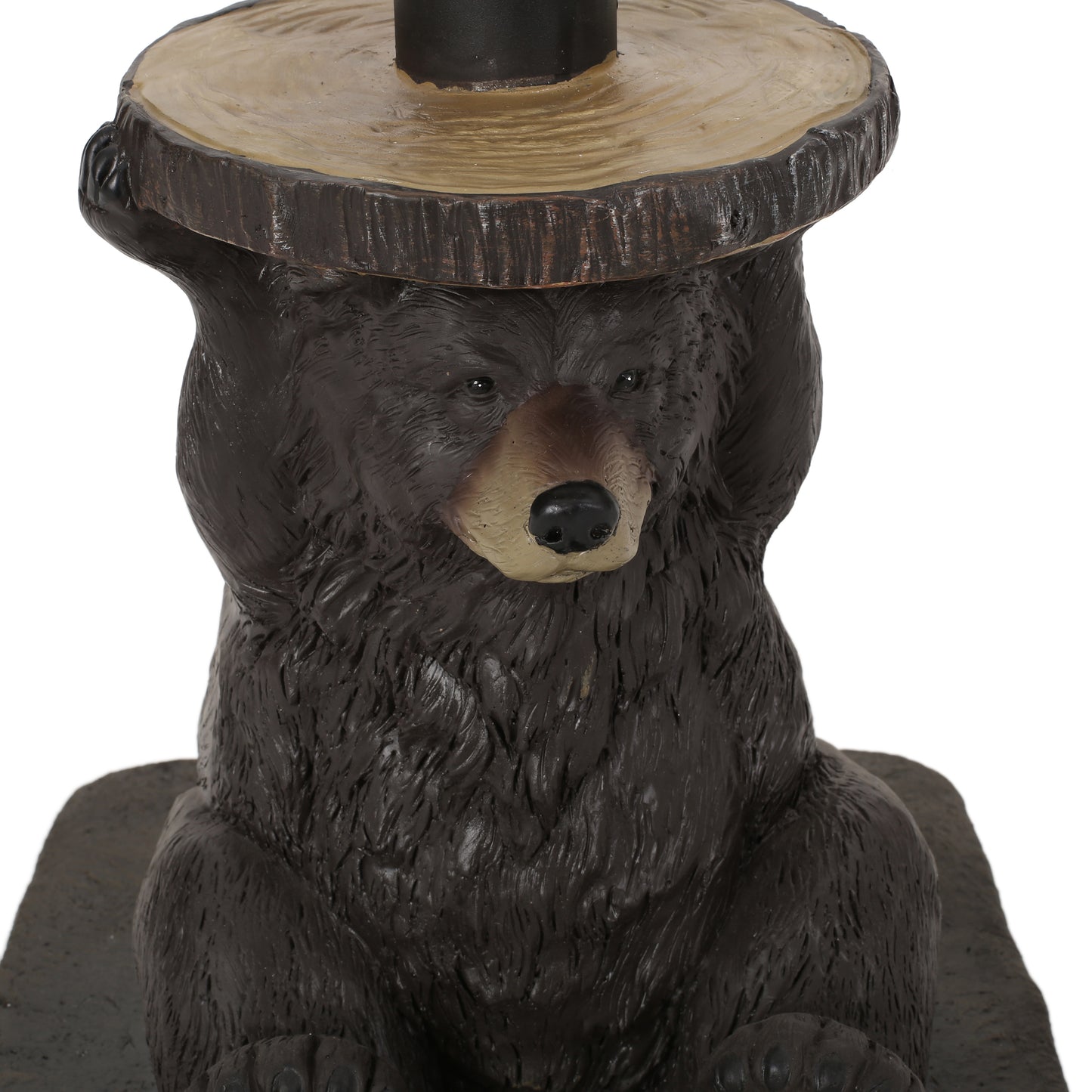 Brown bear statue holding up a wood slice table top rustic lodge decor