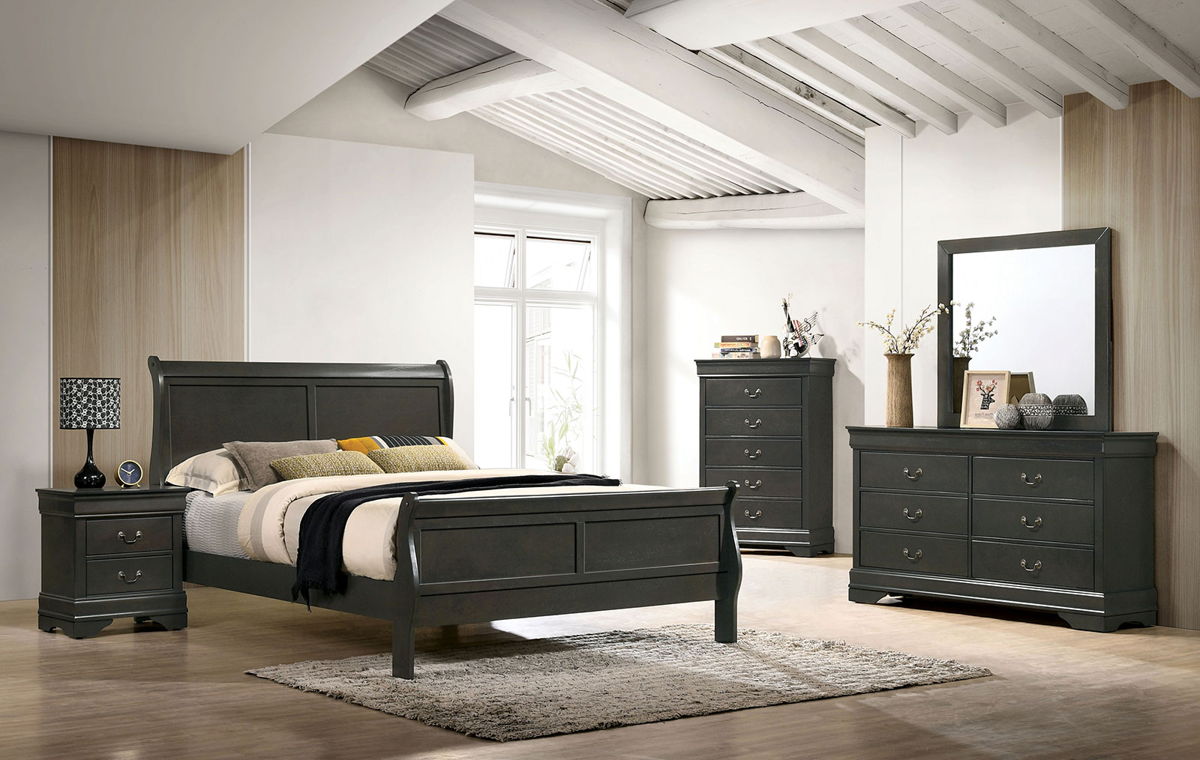 Dark grey sleigh bed with upholstered headboard and matching nightstand