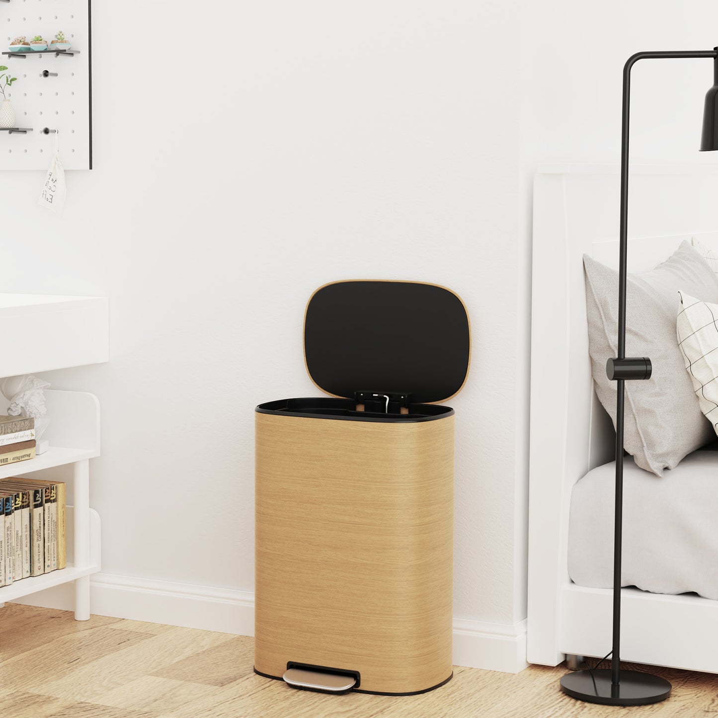 Oval woodgrain pedal trash can with black lid in a modern bedroom