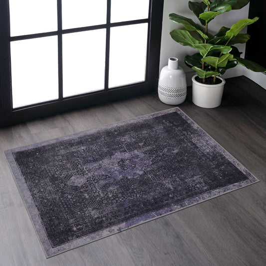 Dark purple distressed oriental rug with intricate patterns perfect for living rooms