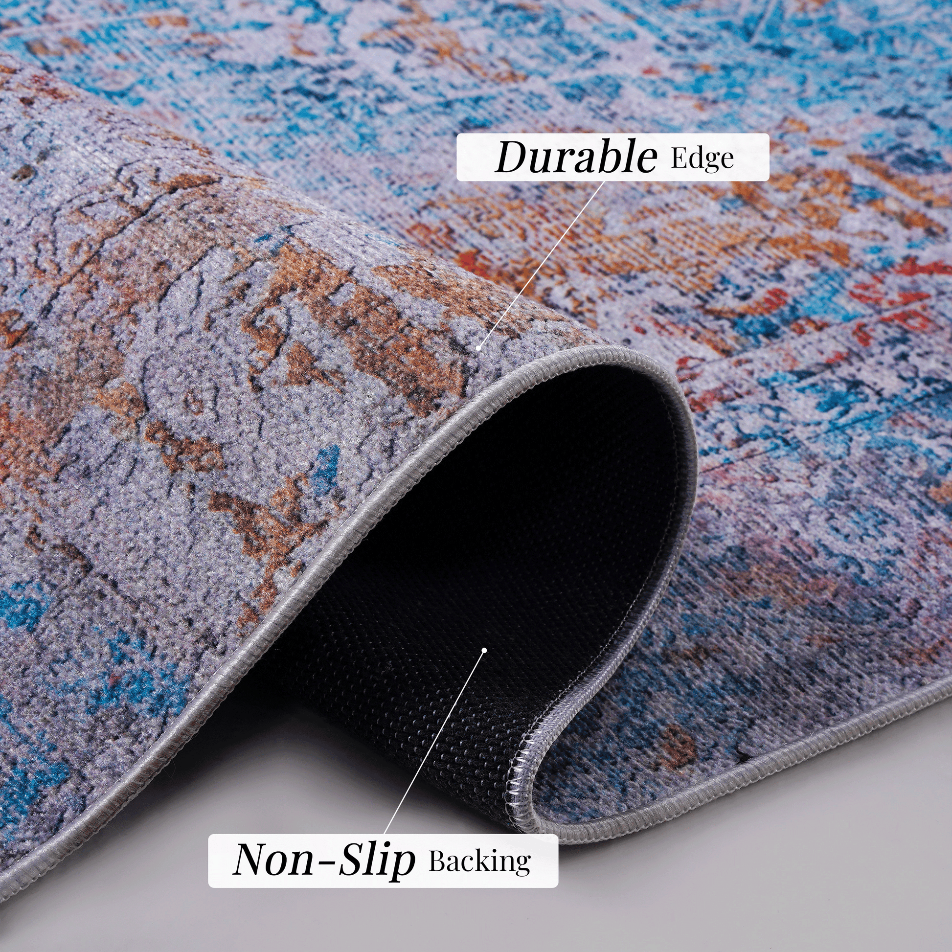 Abstract patterned rug with durable edge construction