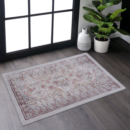 Distressed Persian rug with intricate geometric patterns in red cream and gold tones