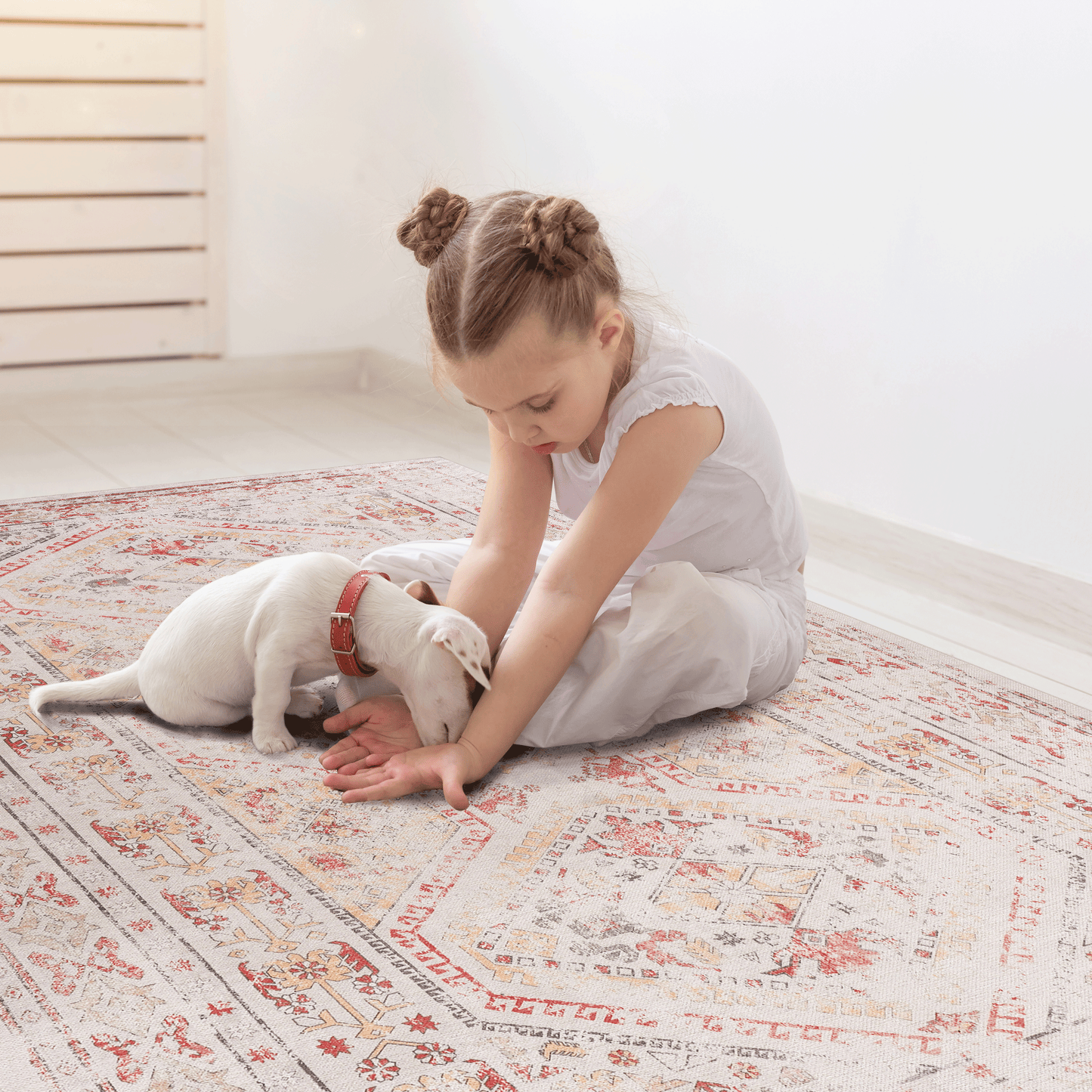 Vintageinspired distressed oriental rug with red and gold geometric patterns
