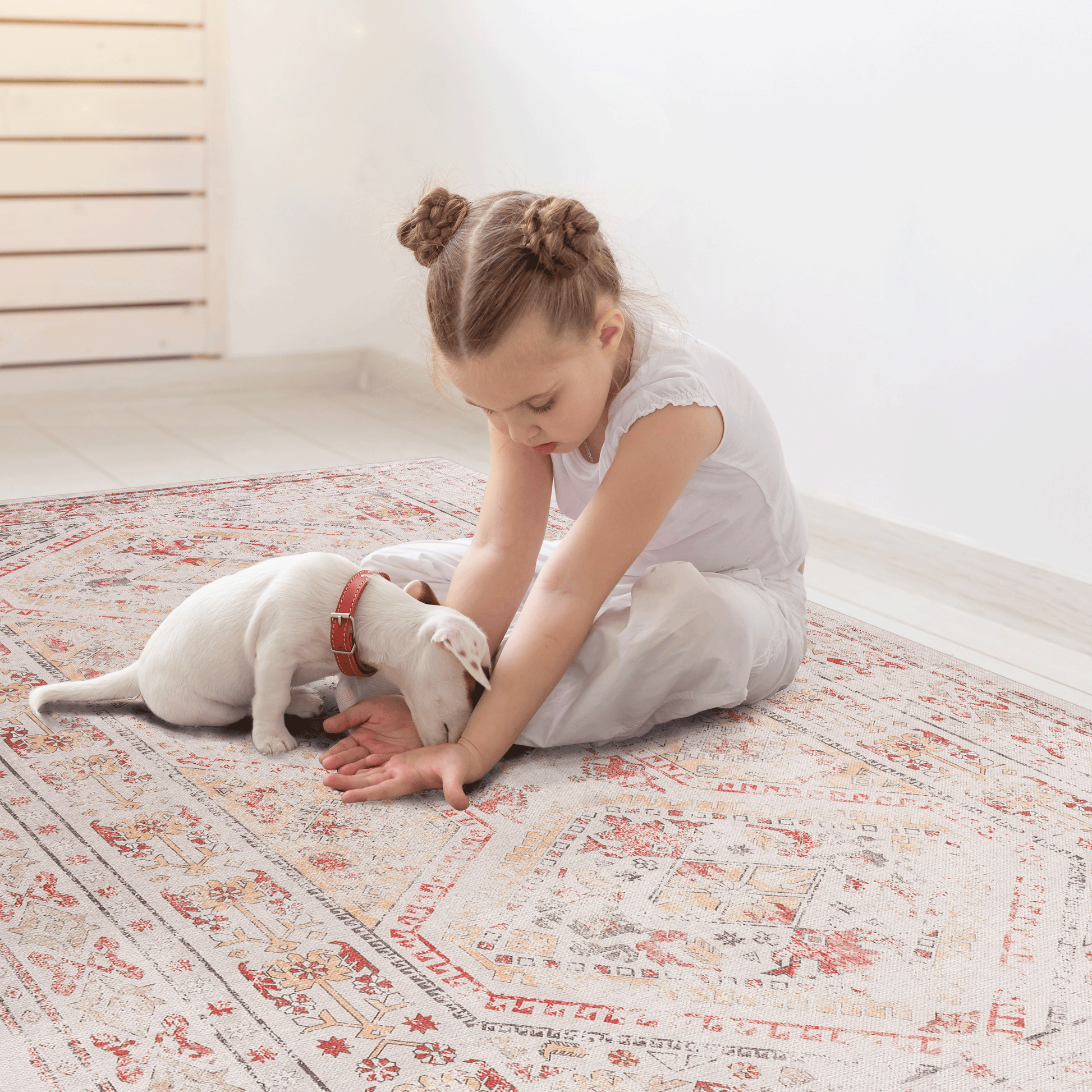 Vintageinspired distressed oriental rug with red and gold geometric patterns