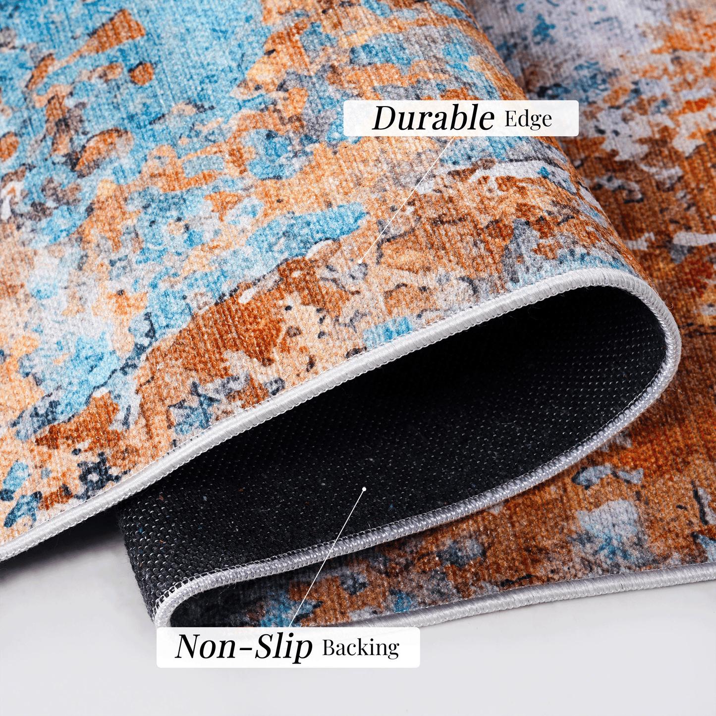 Abstract patterned rug in blue and rust showcasing its durable edge detail