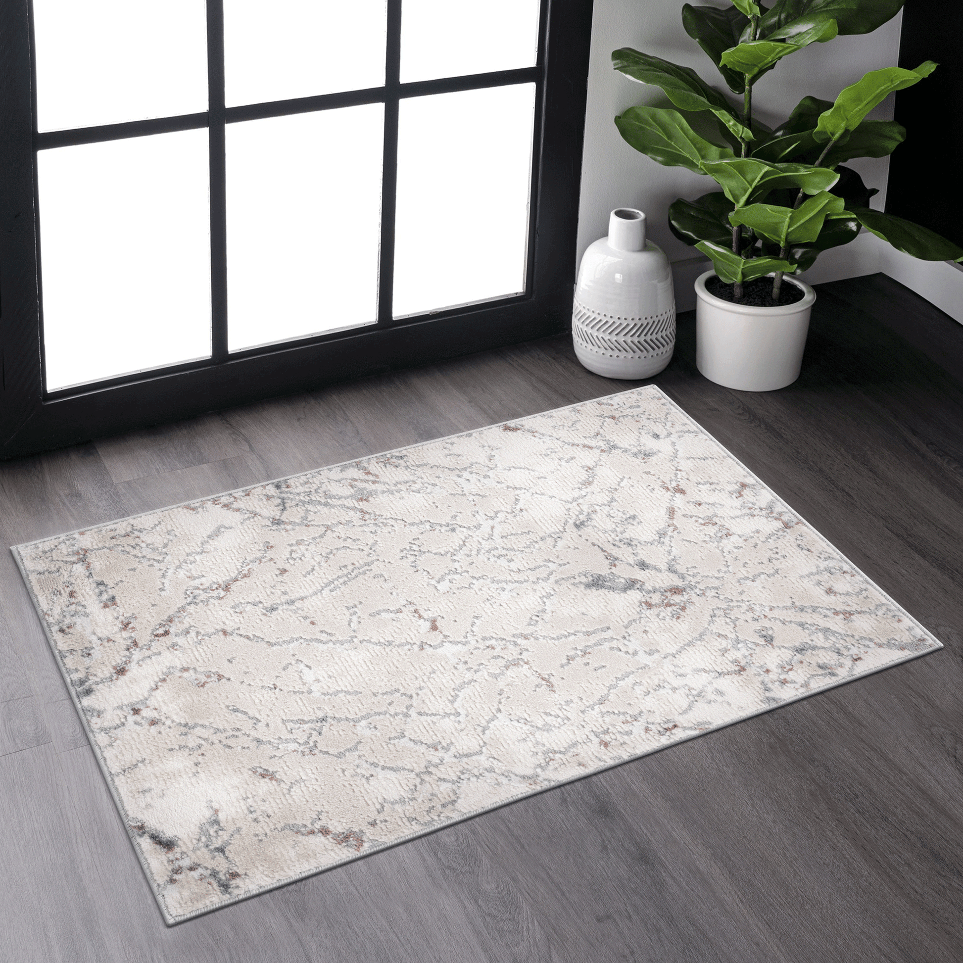 Abstract beige area rug with subtle grey and rust accents for living rooms