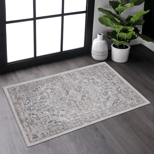 Distressed ivory and grey Persian rug with a classic damask pattern and subtle gold accents