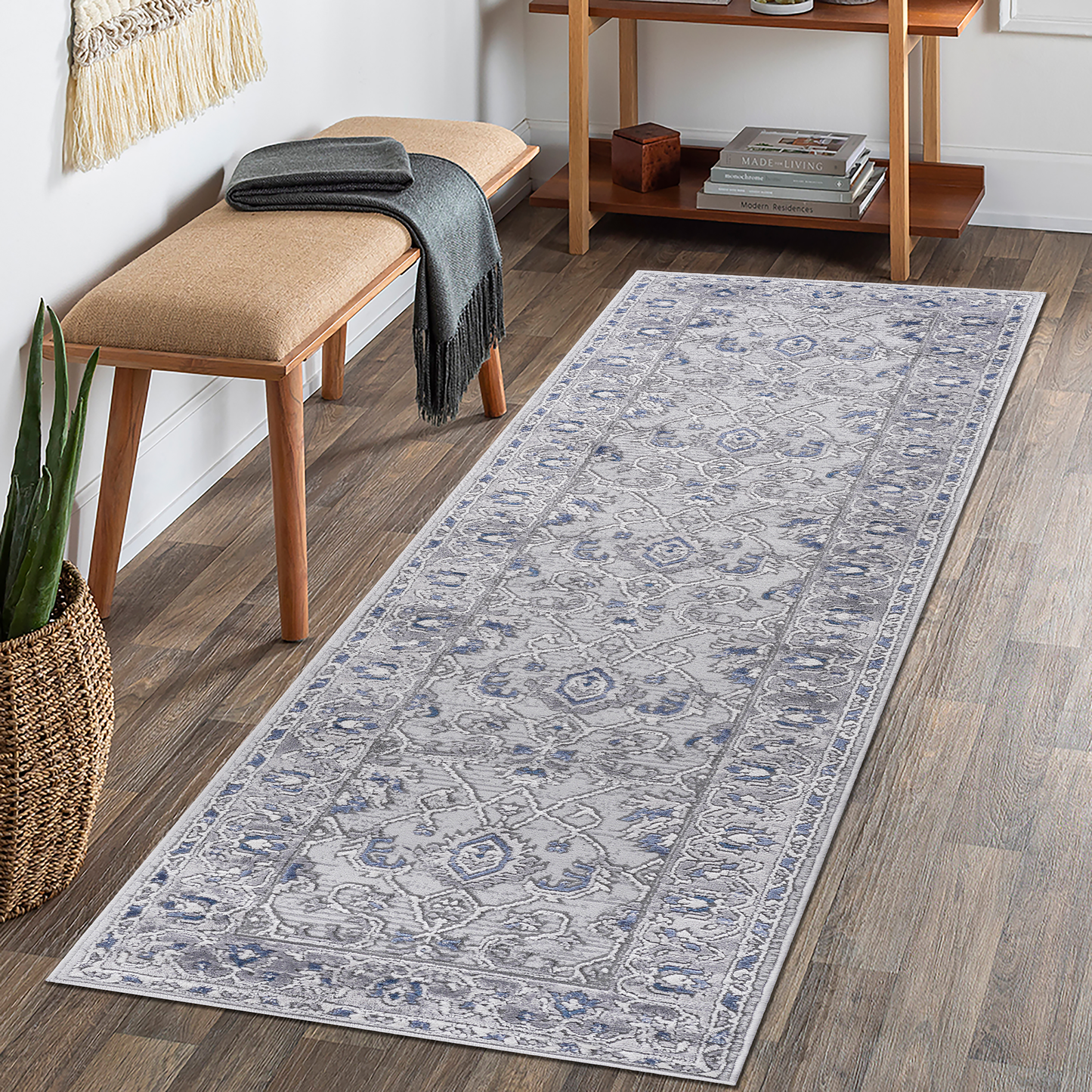 Light gray and blue distressed Persian runner rug with intricate floral pattern