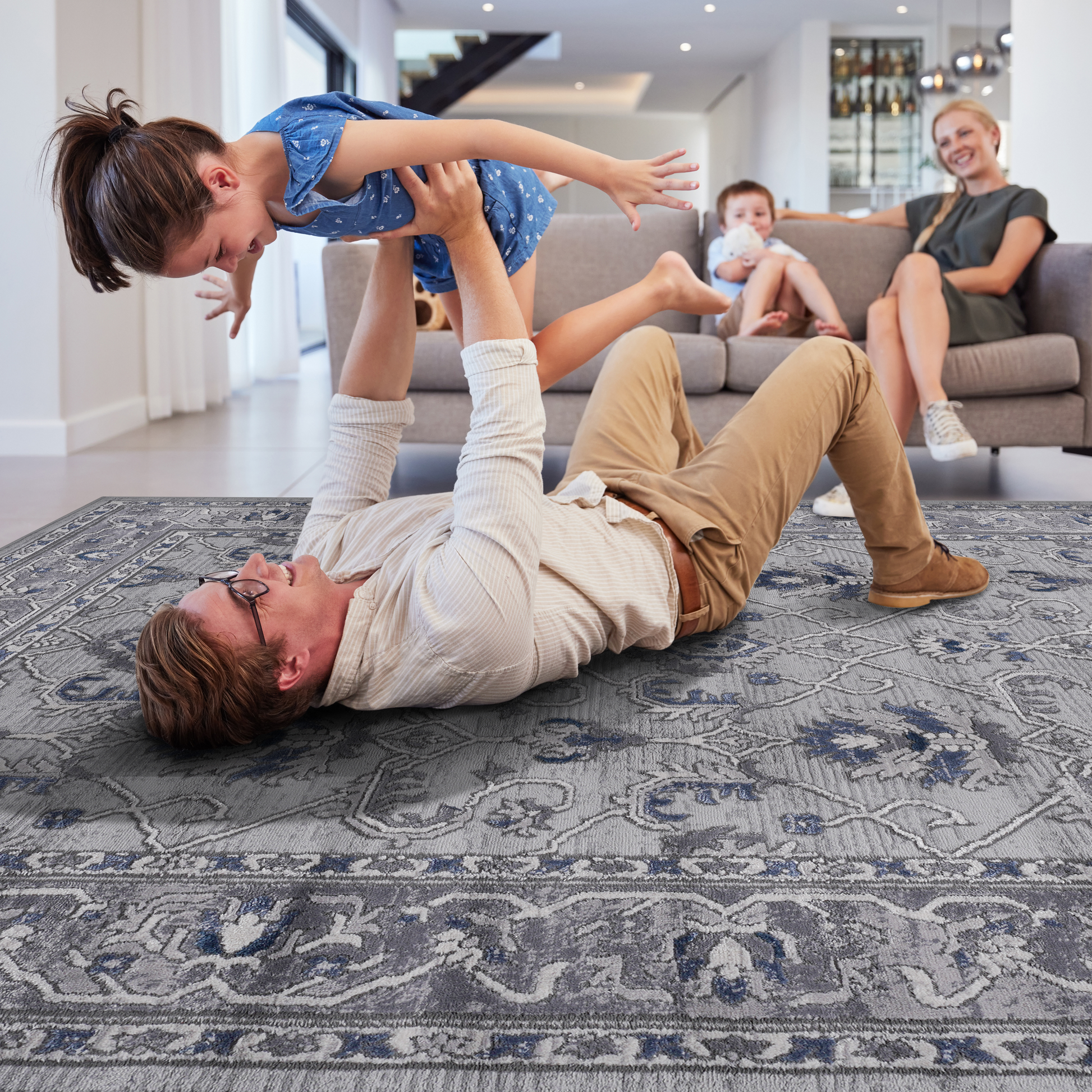 Gray Persianstyle rug with distressed floral pattern perfect for living rooms