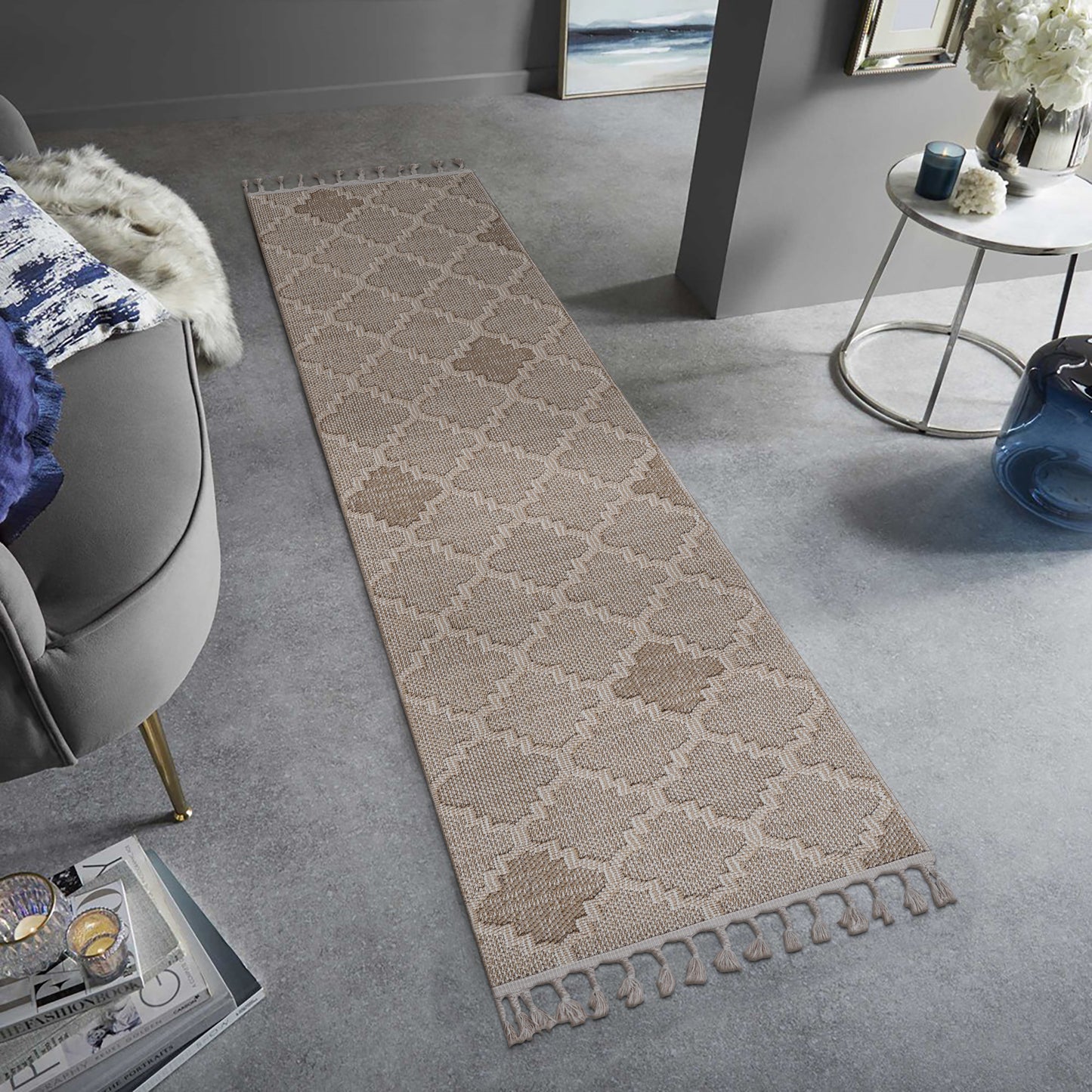 Beige runner rug with a geometric trellis pattern and tassels ideal for hallways