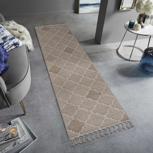 Beige runner rug with a geometric trellis pattern and tassels ideal for hallways
