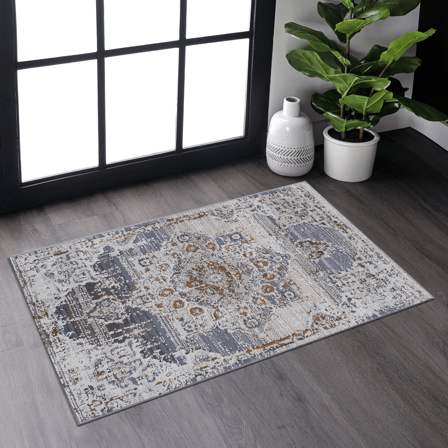 Distressed grey and cream oriental rug with abstract blue and gold accents x