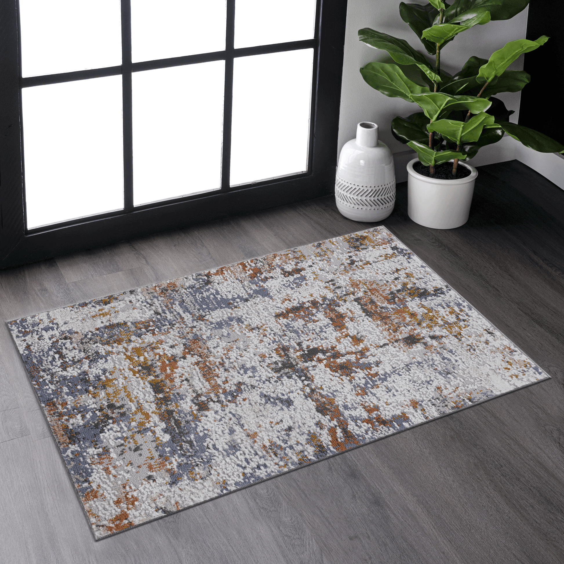 Abstract patterned runner rug in gray white and rust for entryway
