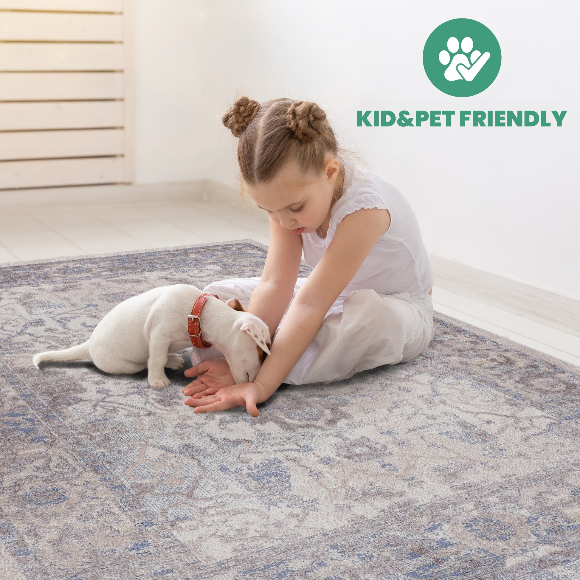 Soft lowpile area rug with vintage blue and beige floral pattern perfect for a nursery