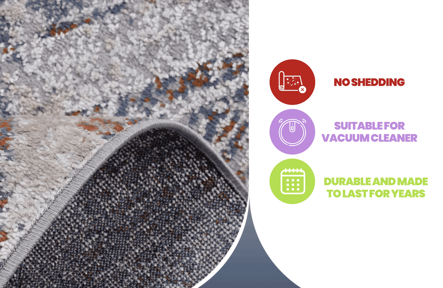 Closeup of a textured grey area rug with abstract blue and rustcolored accents