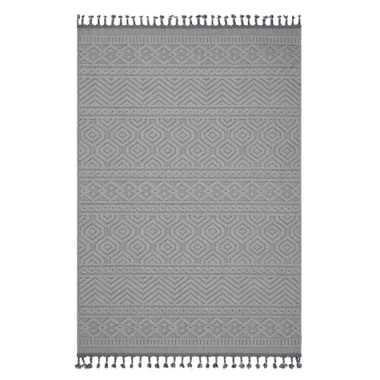 Gray geometric pattern area rug with tassels perfect for a modern living room